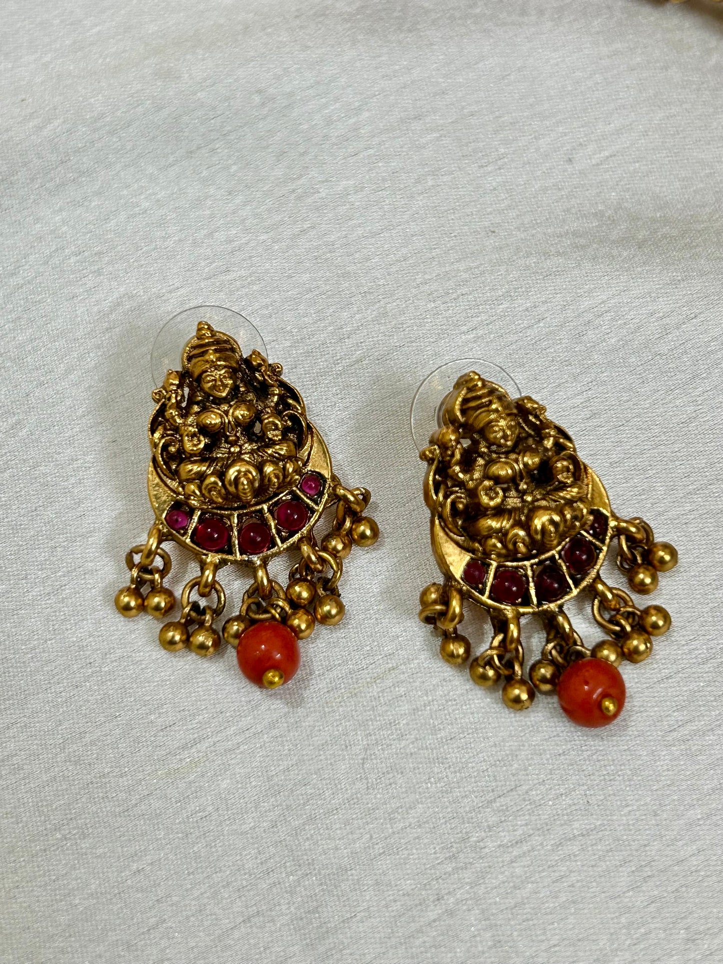 Gold Plated Antique Lakshmi Necklace set embedded with Corals & Nakshi balls