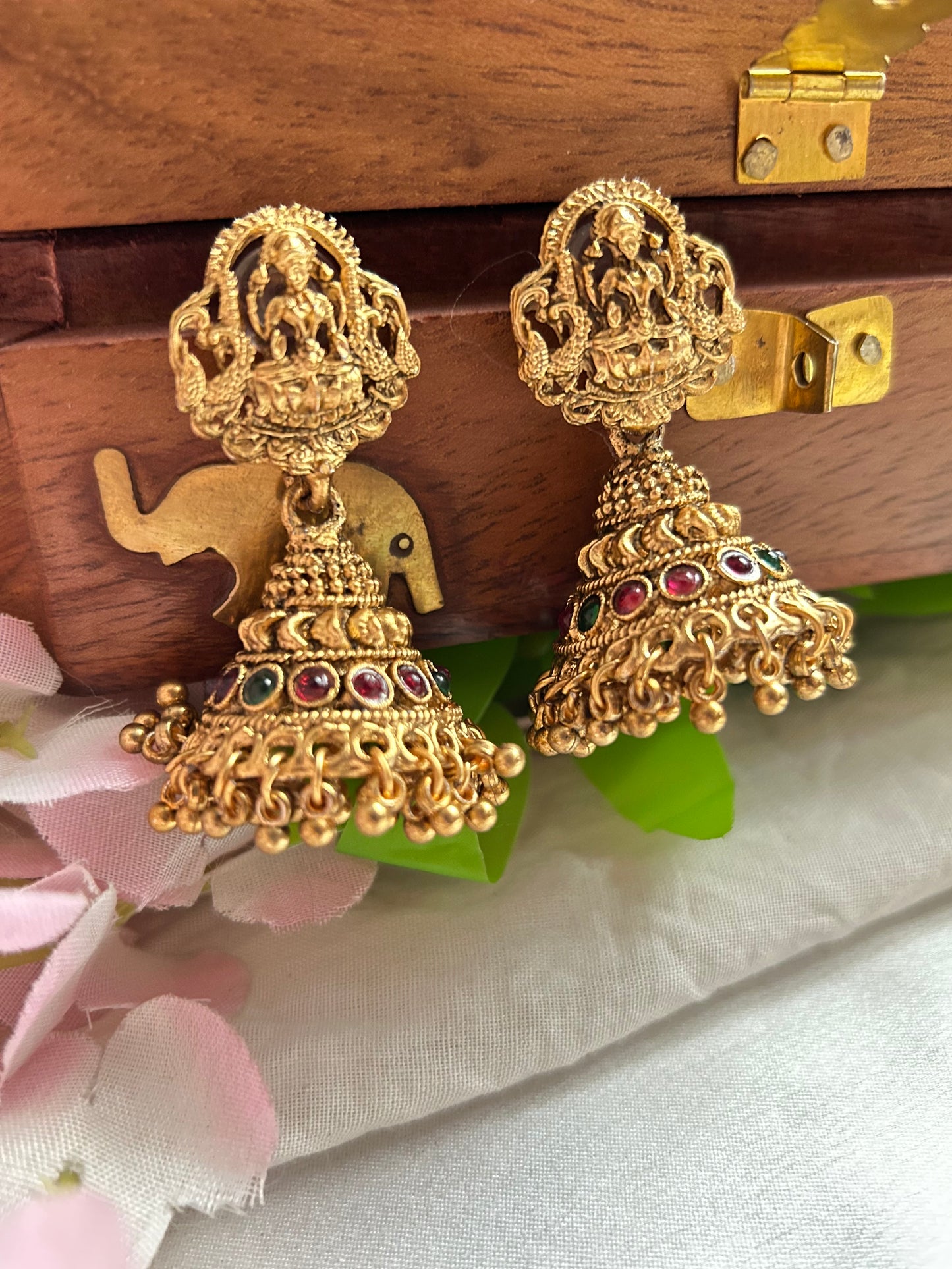 Gold plated green beaded Long Haaram with heavy Laksmi pendant.