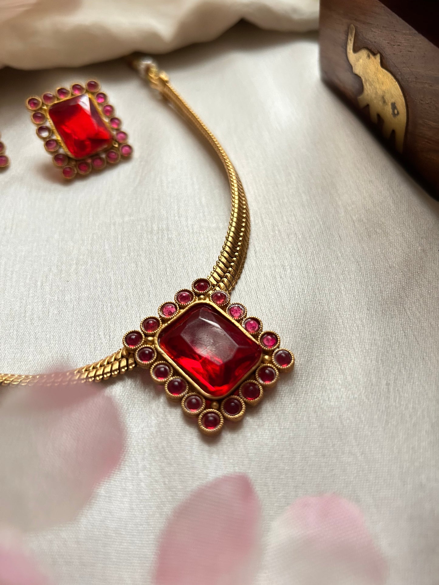 Gold plated choker/Necklace set with red stoned pendant & Earrings