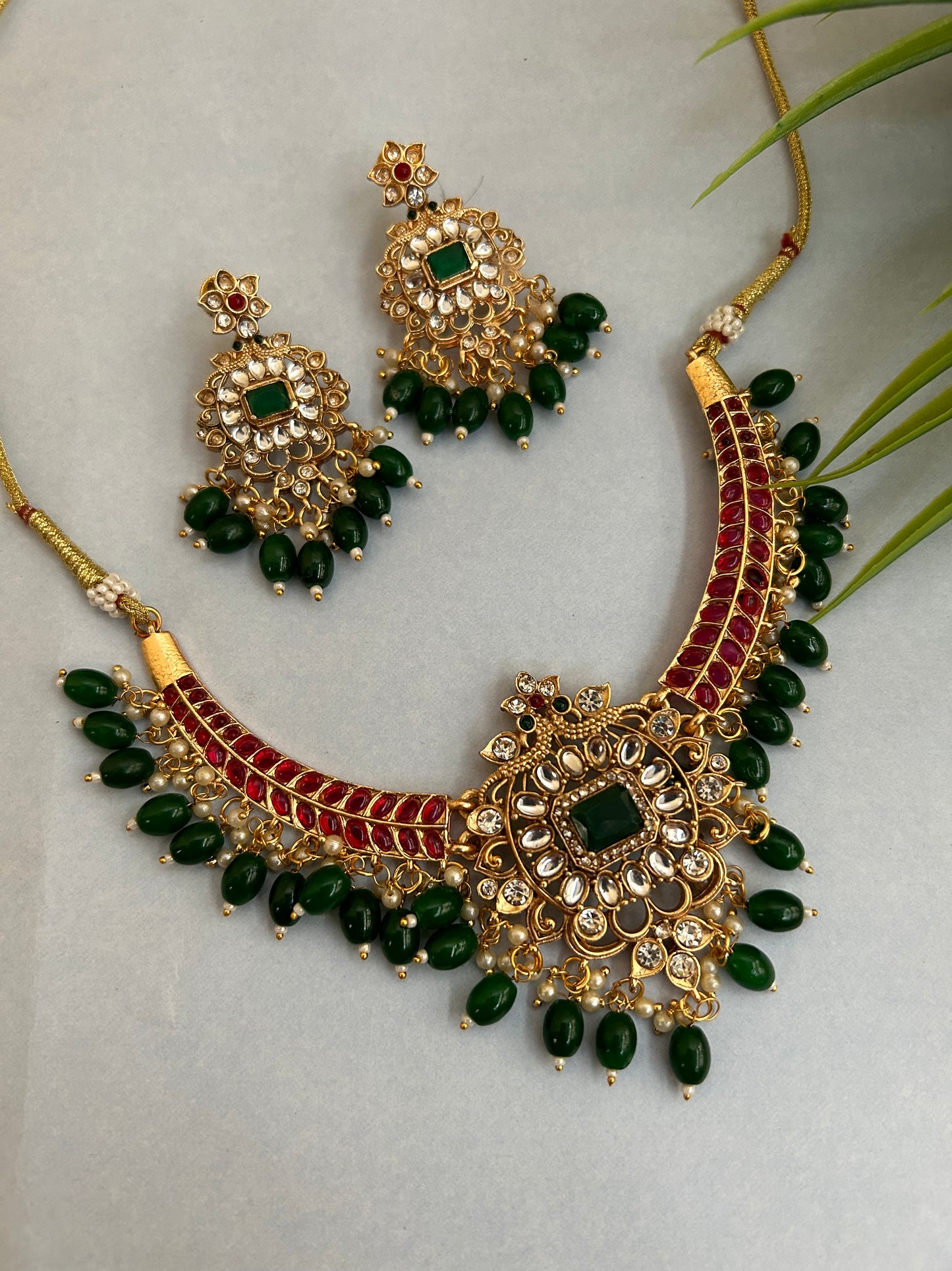 Luxehara's Gold plated short necklace set with matching earrings and hanging pearls with monalisa beads.
