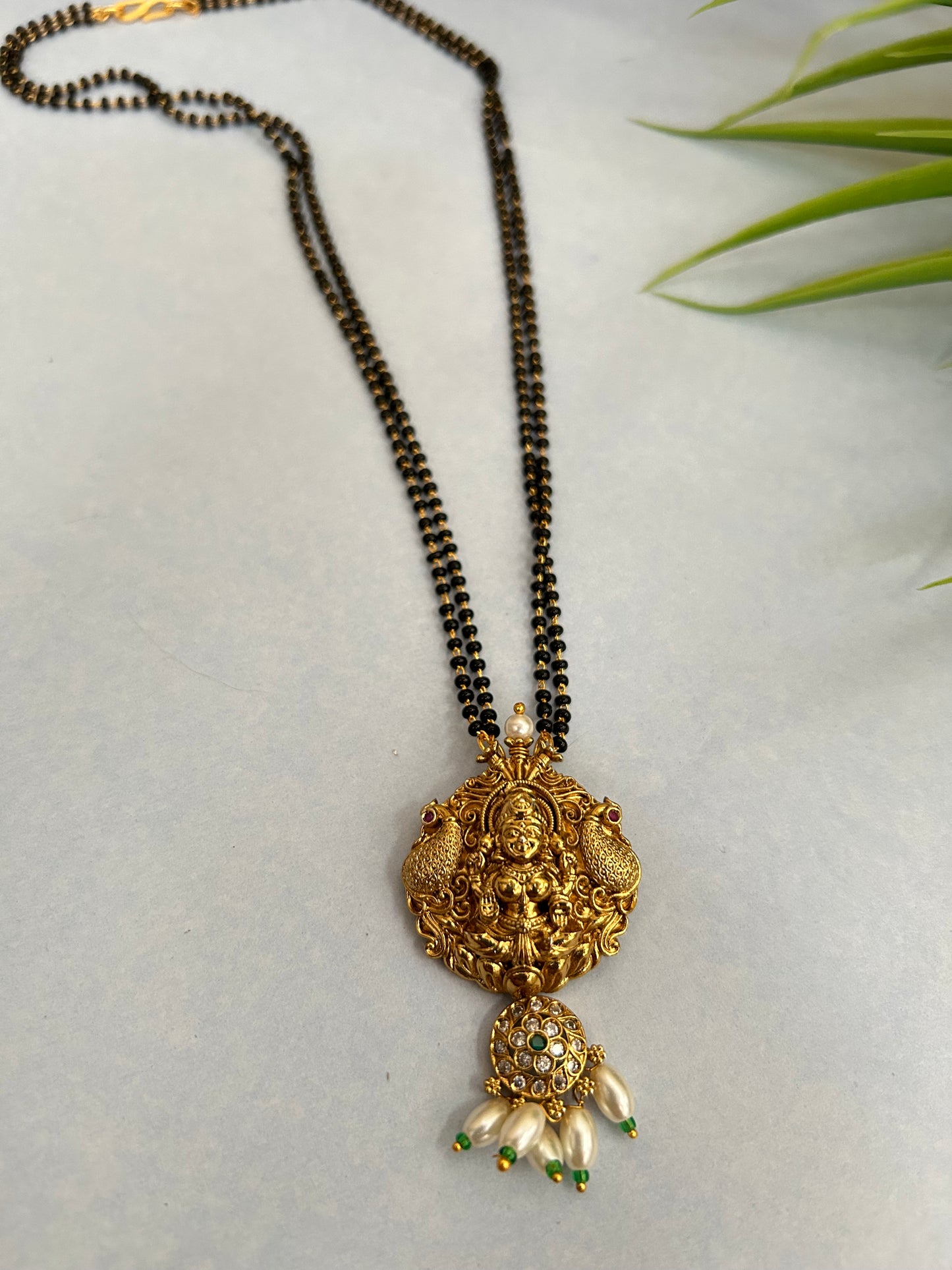 Luxehara Black beads with Gold Plated Lakshmi Pendant ( LHA 23BB )