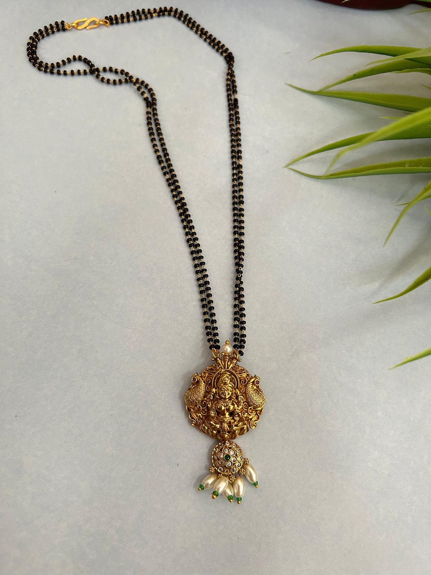 Luxehara Black beads with Gold Plated Lakshmi Pendant ( LHA 23BB )