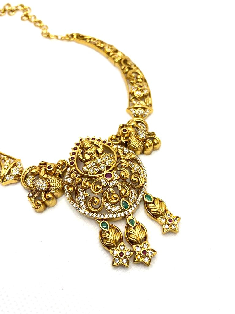 Luxehara's Necklace set with lakshmi pendant and matching earrings.