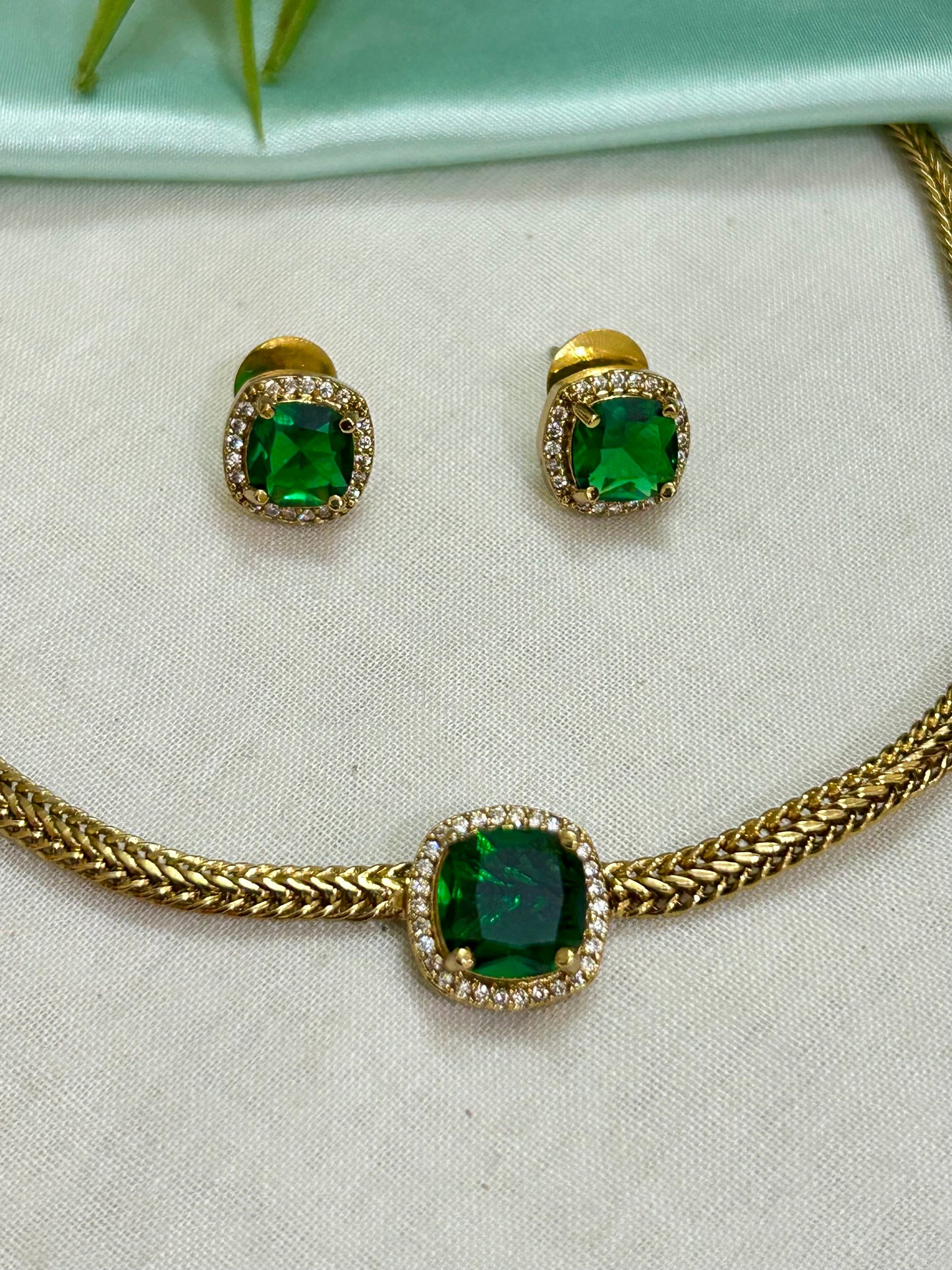 Gold Plated AD Short Necklace with single Emerald Replica stone