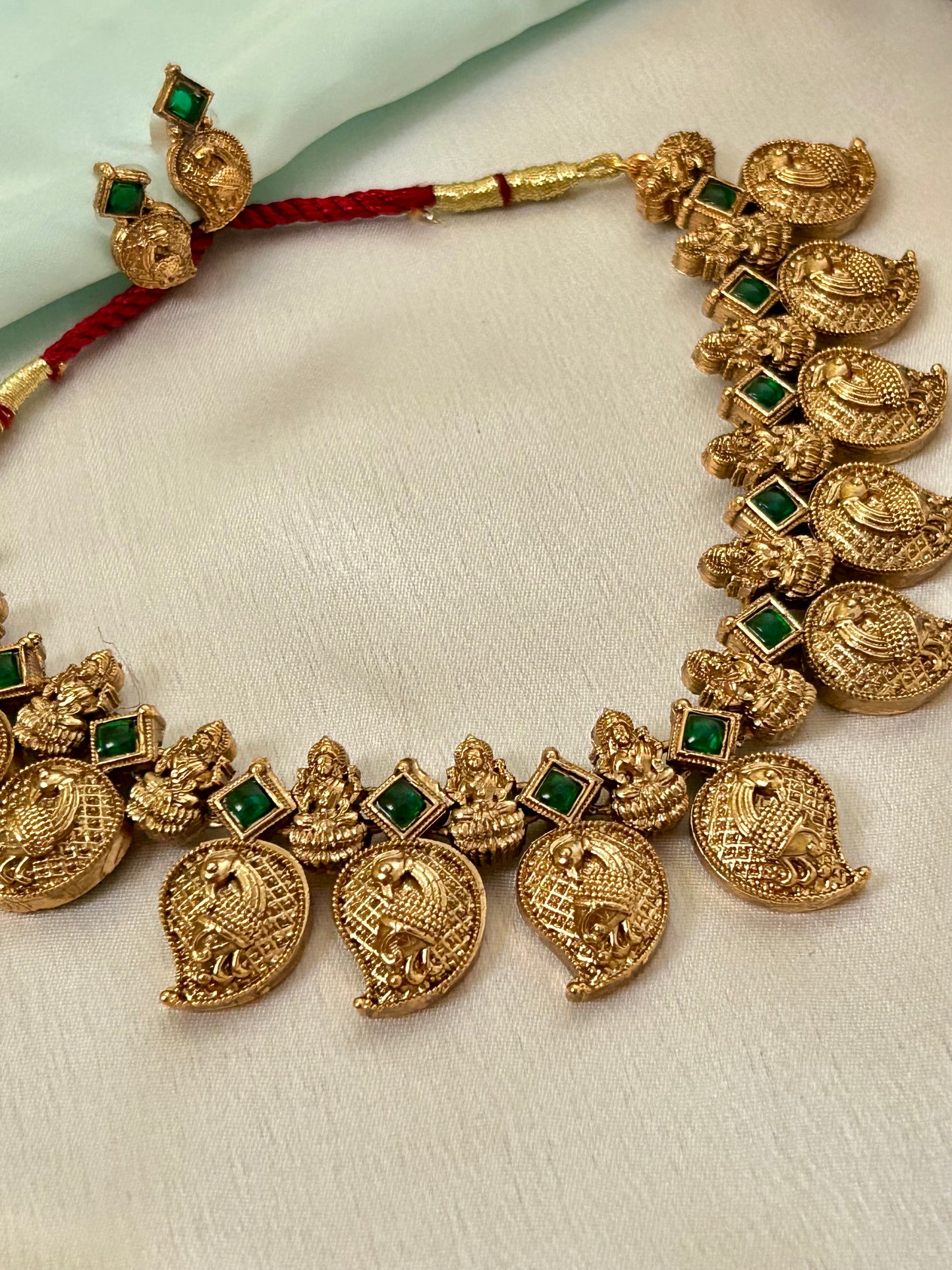 Gold Plated Mango Necklace set with Emerald Look a Like Stones