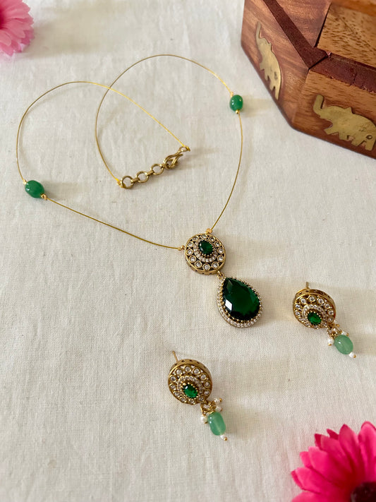Gold Plated Invisible Necklace Embedded with Emerald Green Stone & AD Stones
