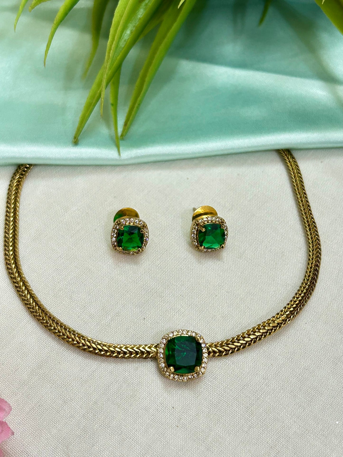 Gold Plated AD Short Necklace with single Emerald Replica stone