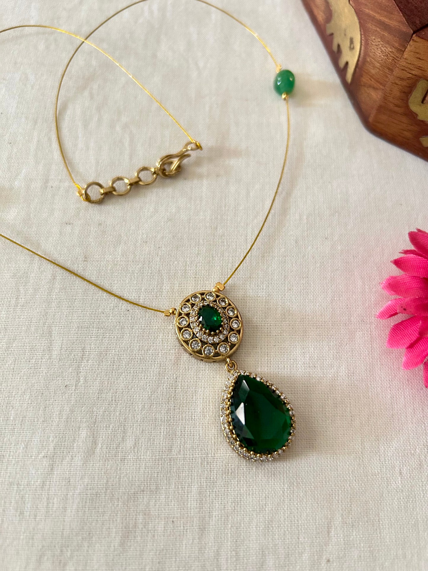 Gold Plated Invisible Necklace Embedded with Emerald Green Stone & AD Stones