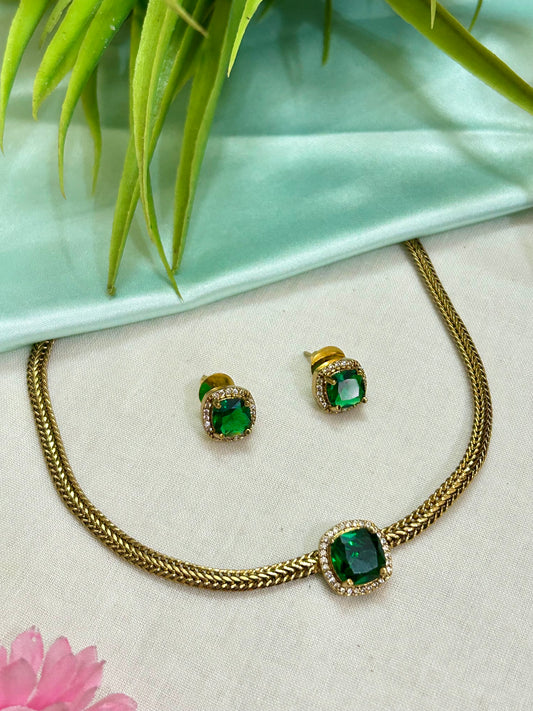 Gold Plated AD Short Necklace with single Emerald Replica stone