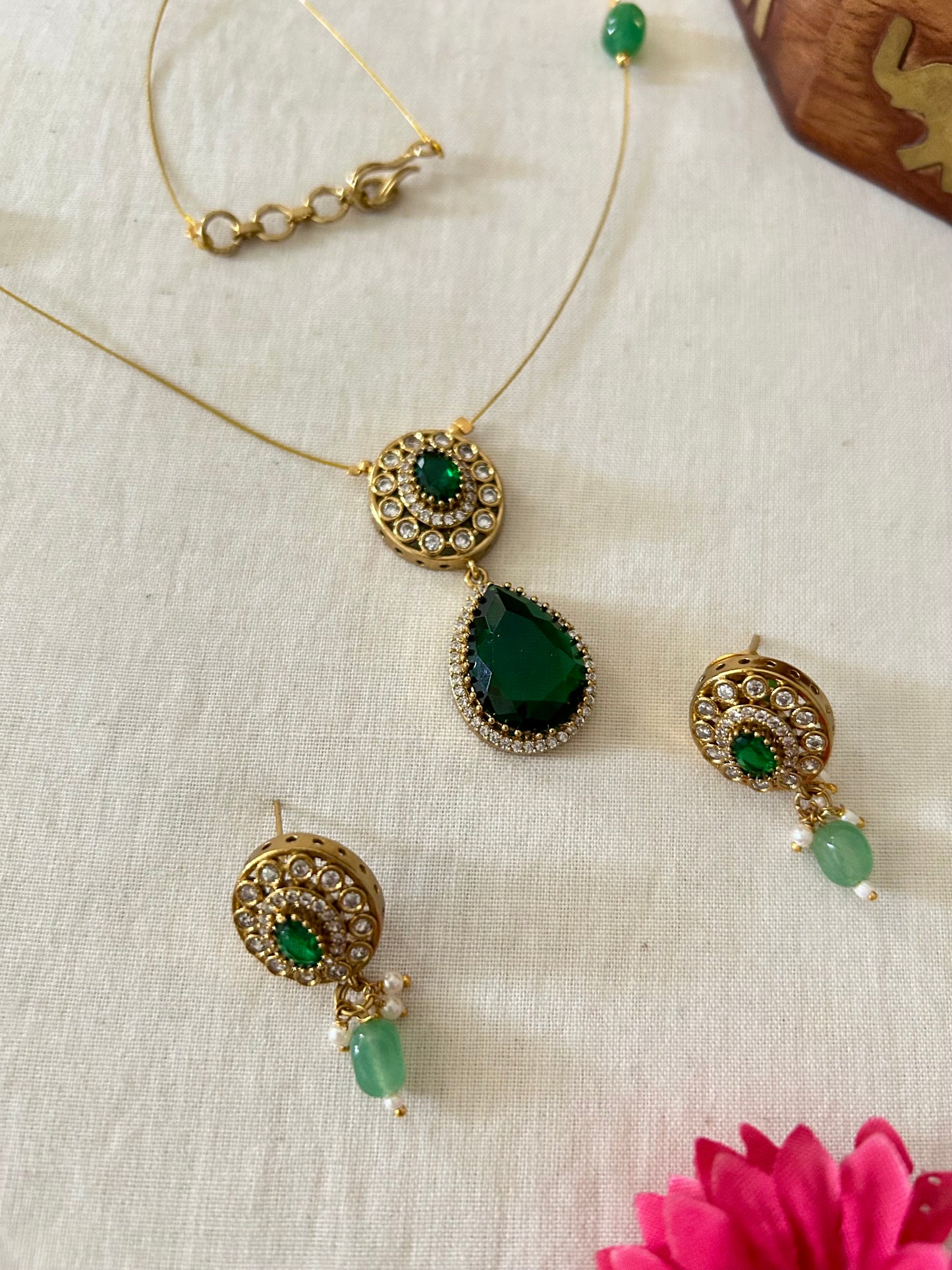 Gold Plated Invisible Necklace Embedded with Emerald Green Stone & AD Stones