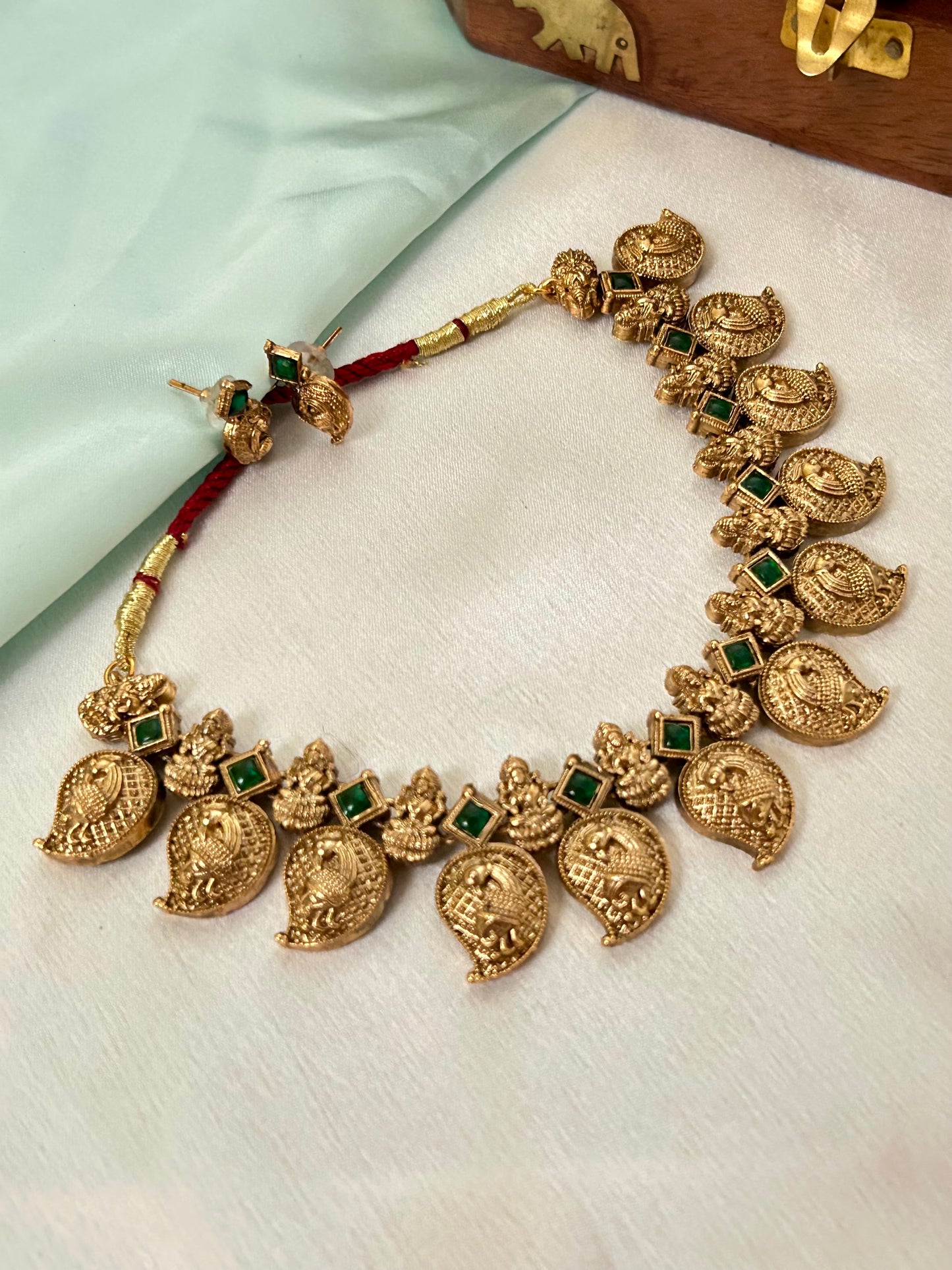 Gold Plated Mango Necklace set with Emerald Look a Like Stones
