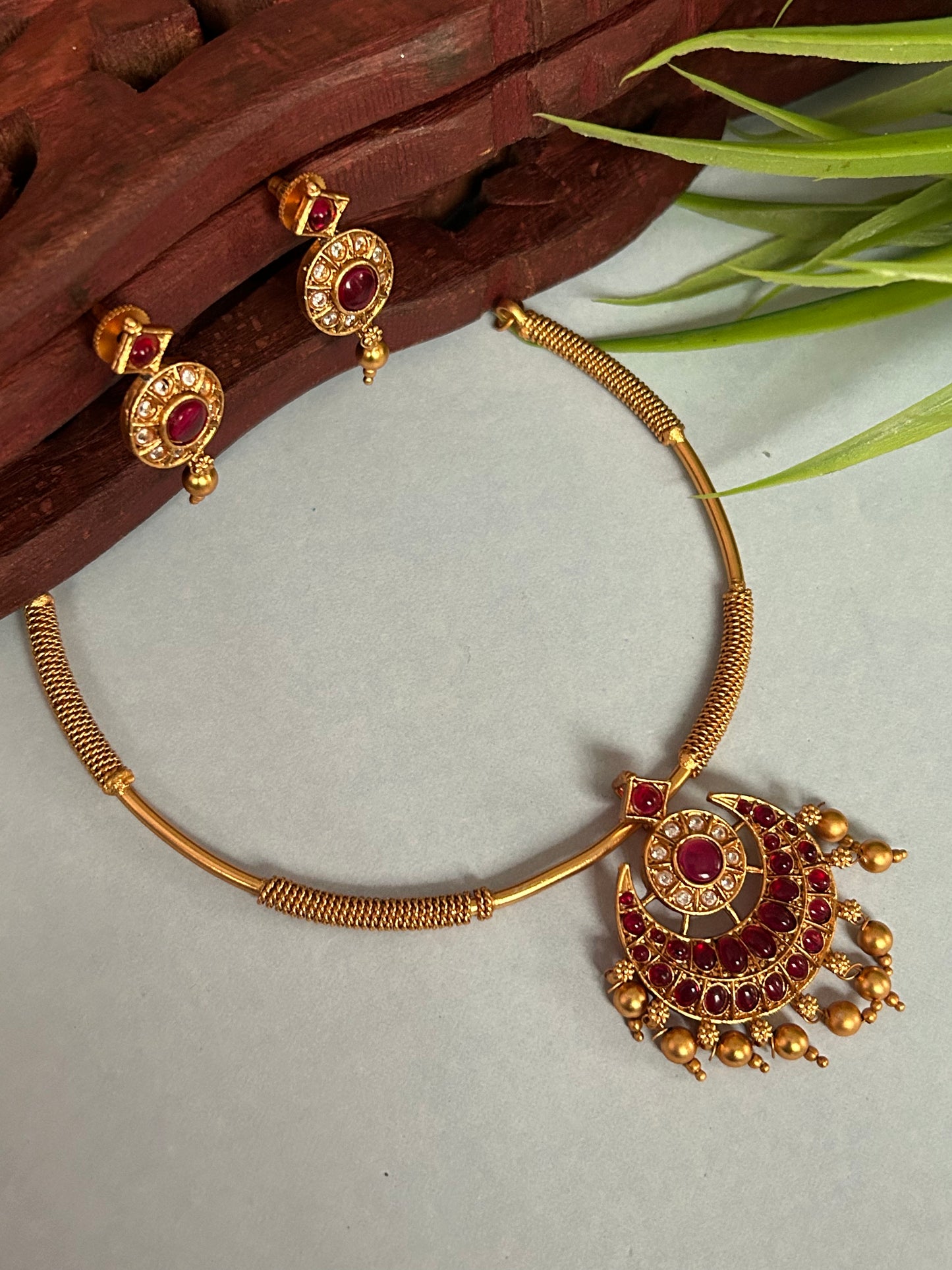Gold Plated Hasli/Kanti Necklace Set with Kemp & Green stones. ( LHA CN 05 )