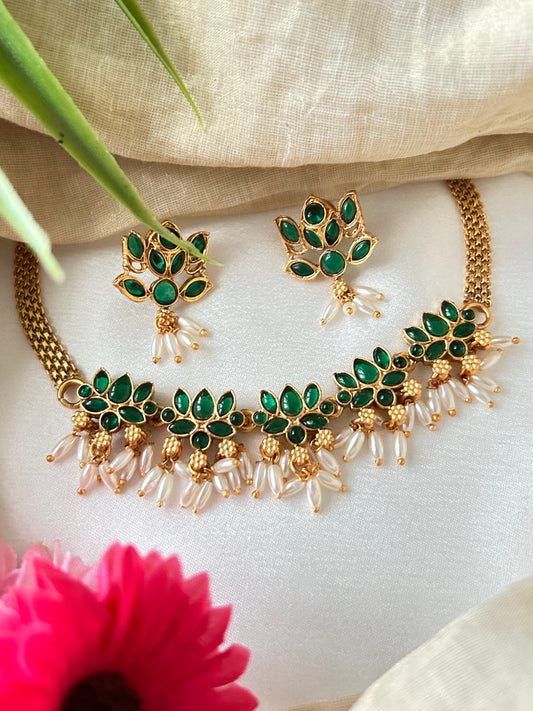 Gold Plated green stoned Choker set with Rice pearls