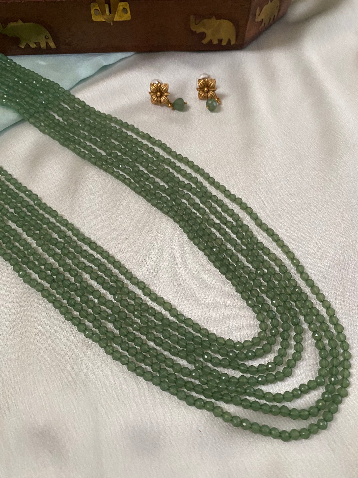 7 layered green beaded chain with earrings