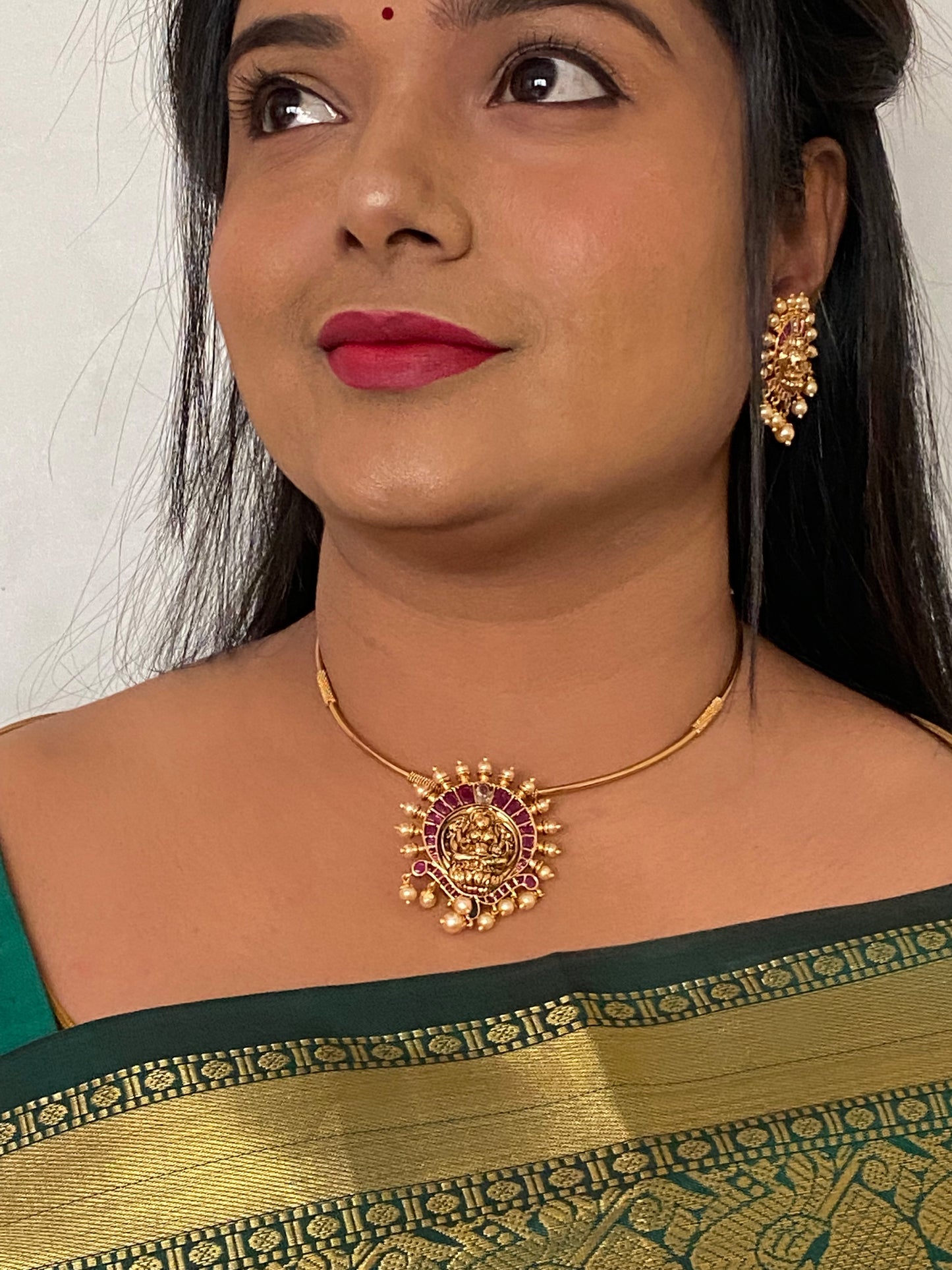 LuxeHara's Gold plated Kanti Necklace Along with Lakshmi Pendant & Beautiful Earrings.