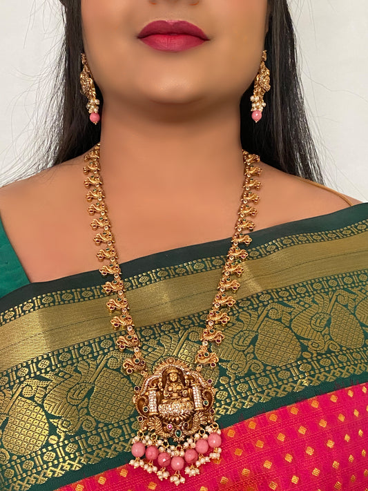 Luxehara's Long Haara with Lakshmi pendant, trending Monalisa beads with matching earrings.