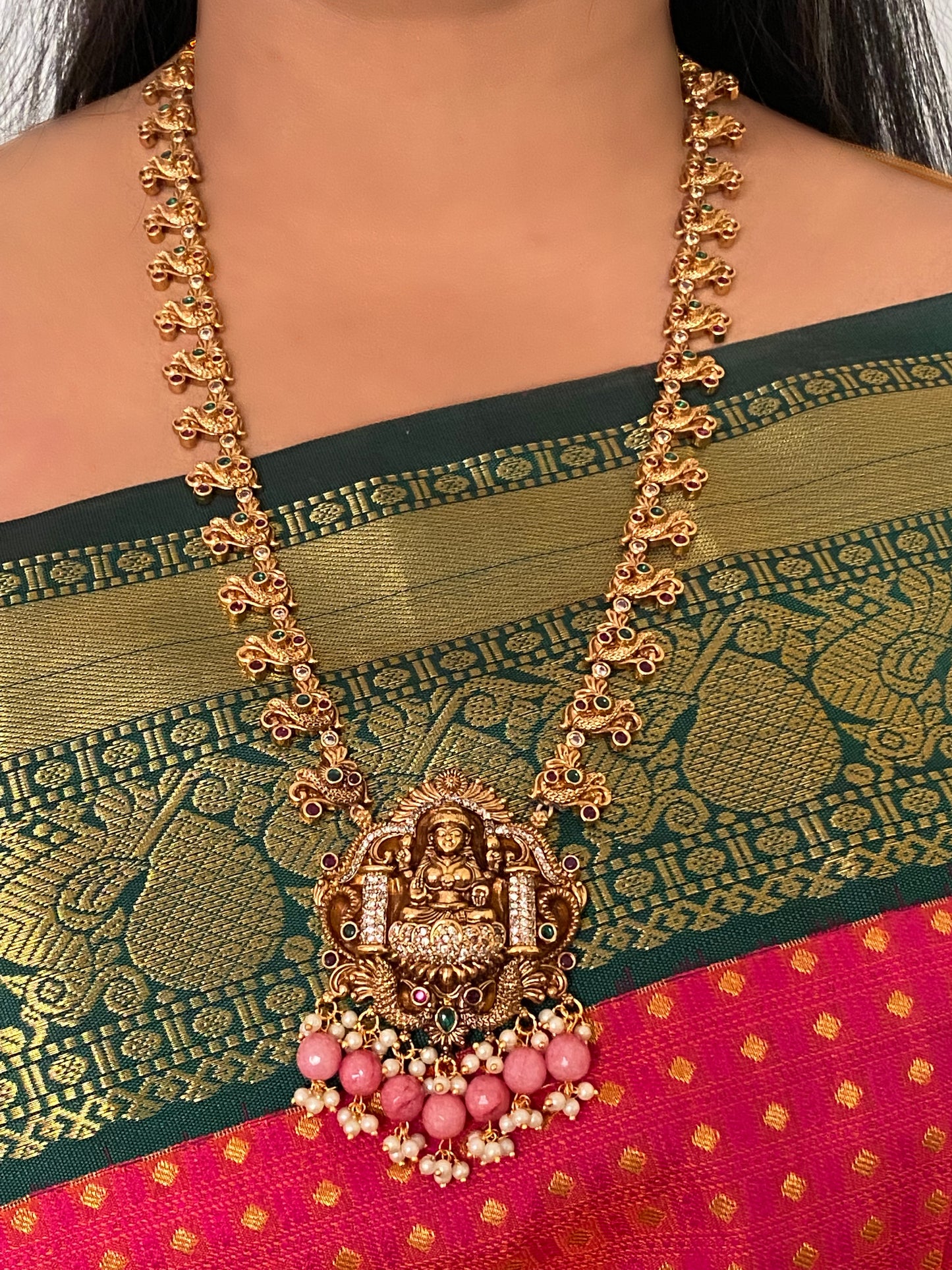 Luxehara's Long Haara with Lakshmi pendant, trending Monalisa beads with matching earrings.
