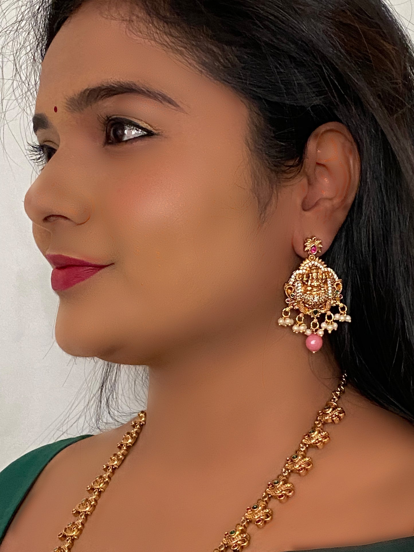 Luxehara's Long Haara with Lakshmi pendant, trending Monalisa beads with matching earrings.