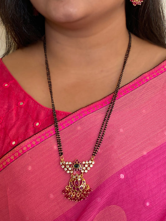 Luxehara's blackbeads with earrings & large pendant embedded with red & ruby stones with added cz stones.