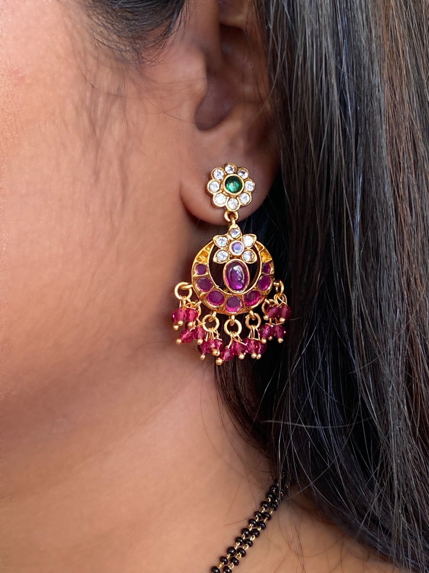 Luxehara's blackbeads with earrings & large pendant embedded with red & ruby stones with added cz stones.