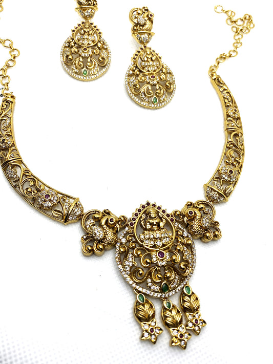 Luxehara's Necklace set with lakshmi pendant and matching earrings.