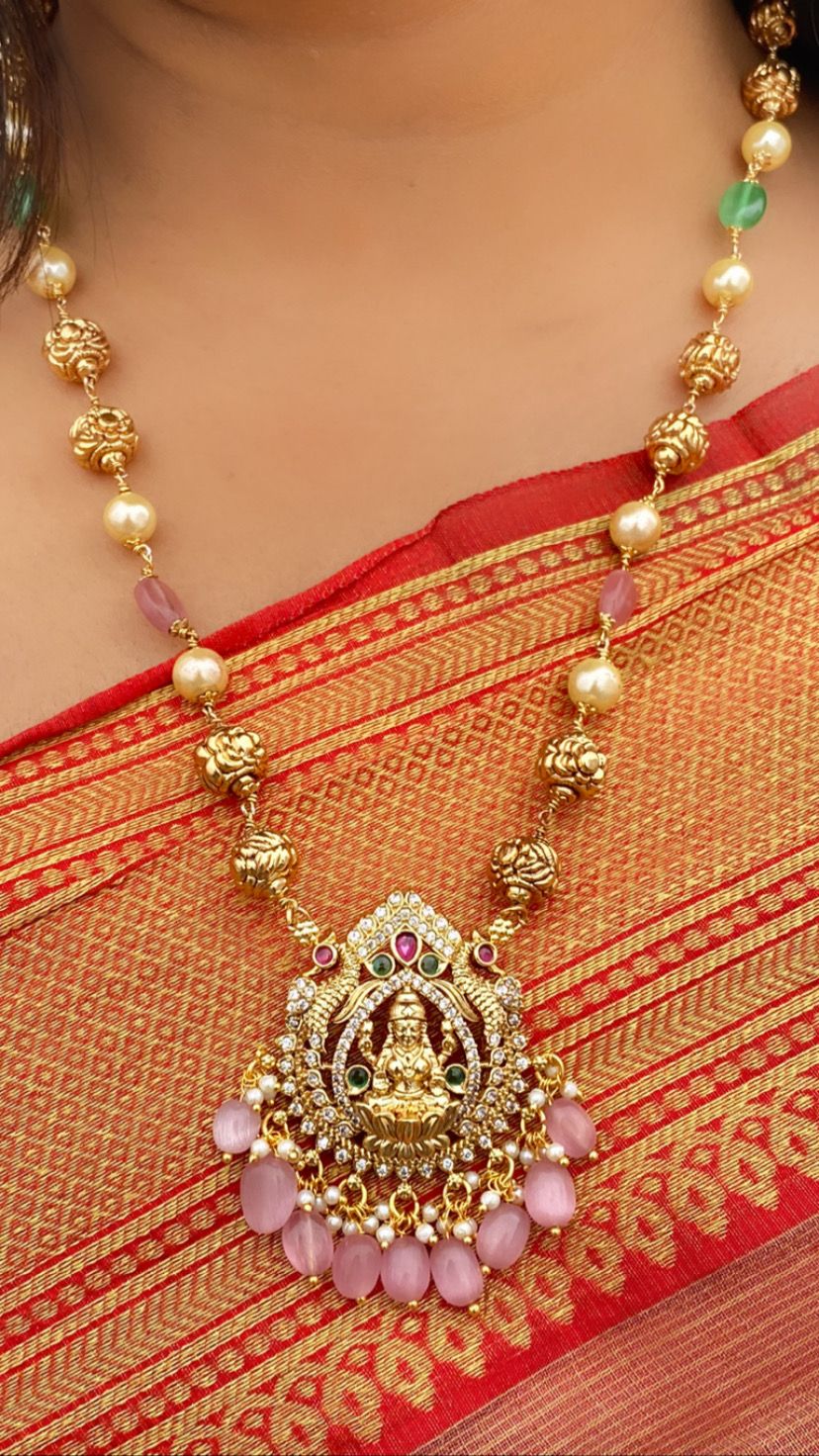 Luxehara's Long necklace set with Lakshmi pendant with matching earrings.